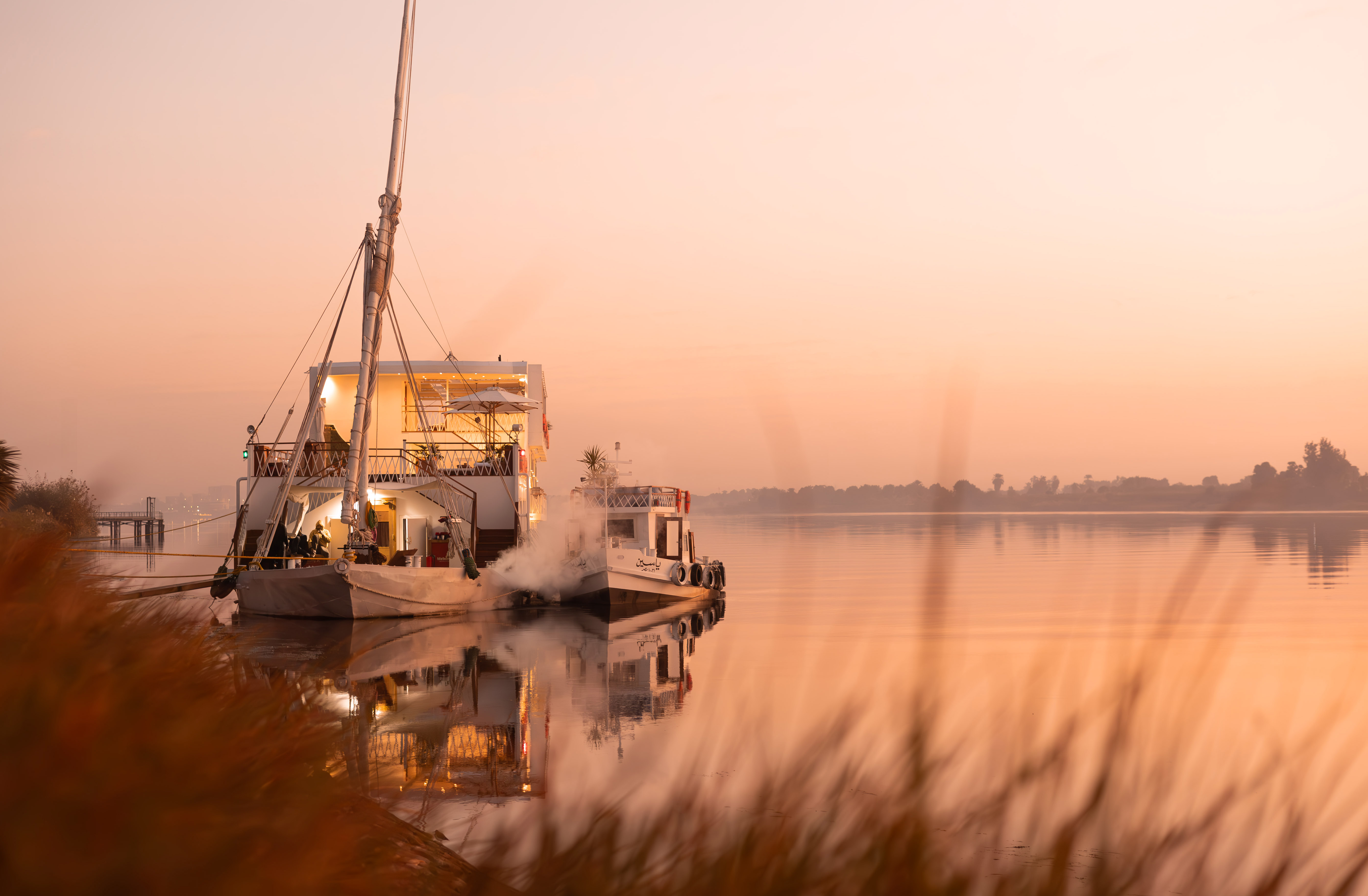 Gaia Dahabiya sailing at sunrise on the Nile
