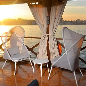 Sunset deck seating aboard Queens by TIME
