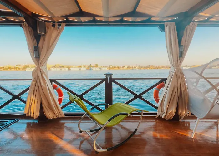Shaded upper-deck lounge aboard Queens by TIME