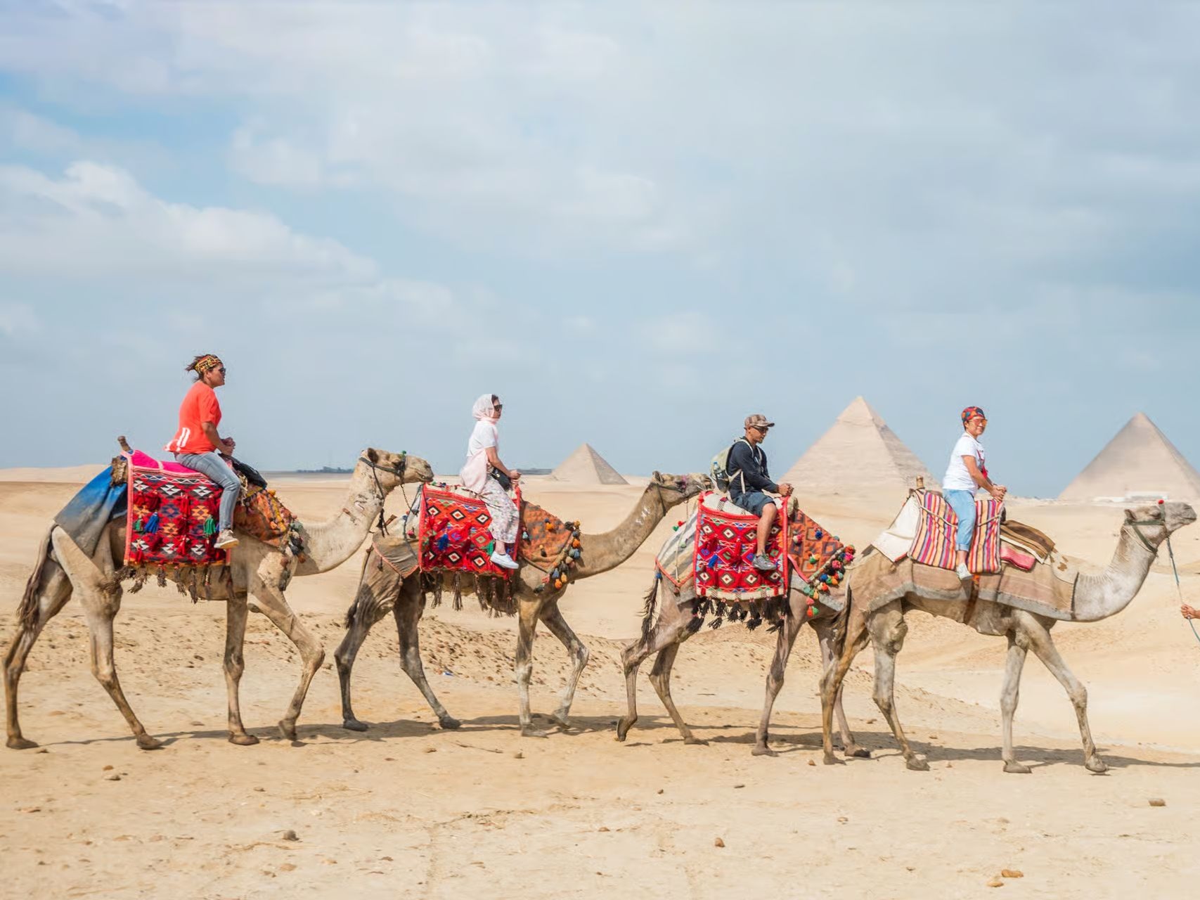 Couple dressed in Pharaonic attire smiling on the boat