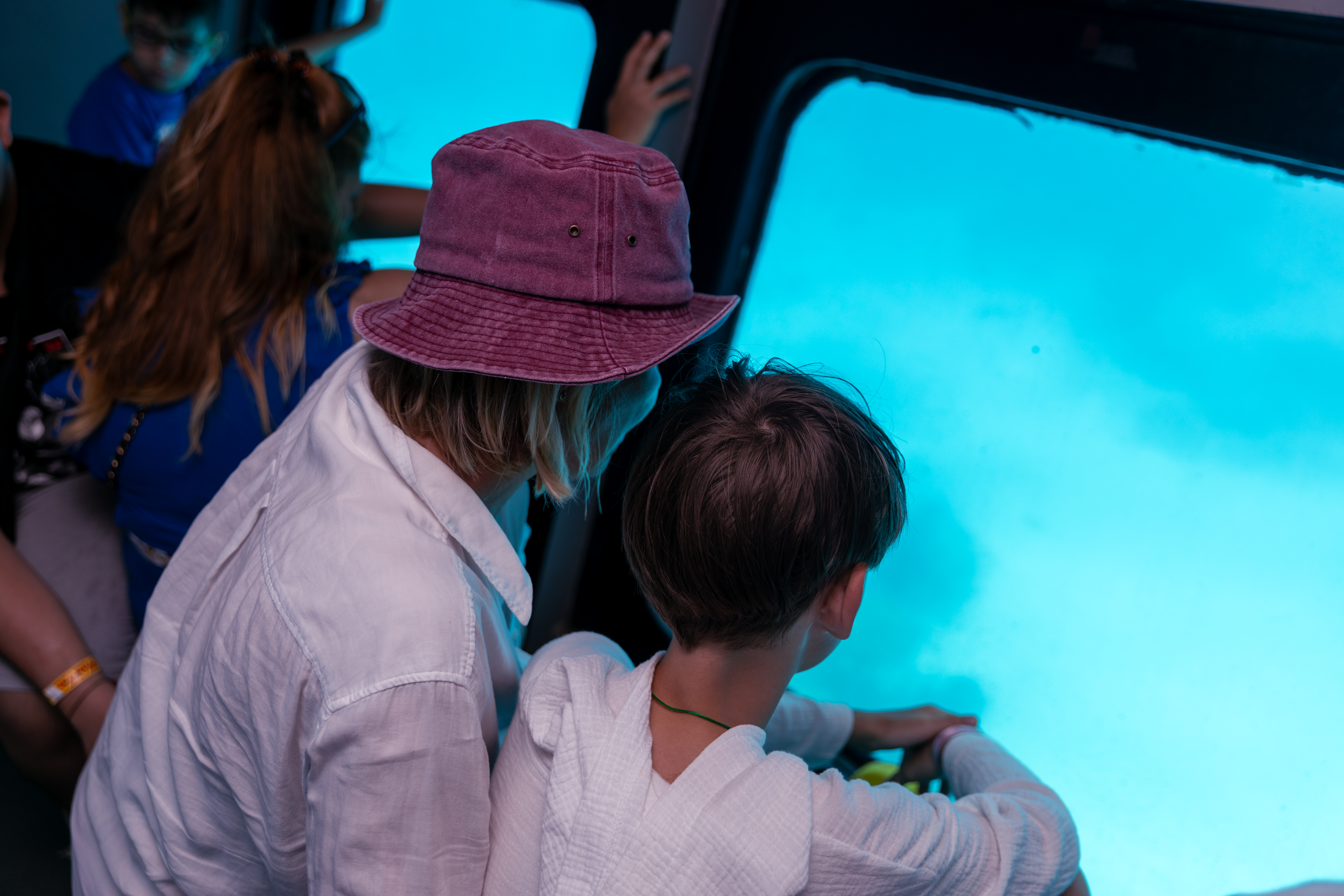 Family enjoying underwater views from the semi-submarine
