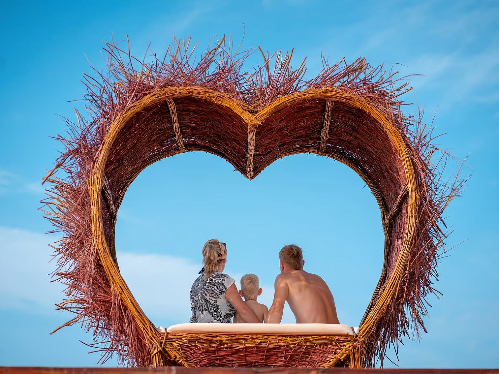 Heart-shaped photo spot overlooking the sea