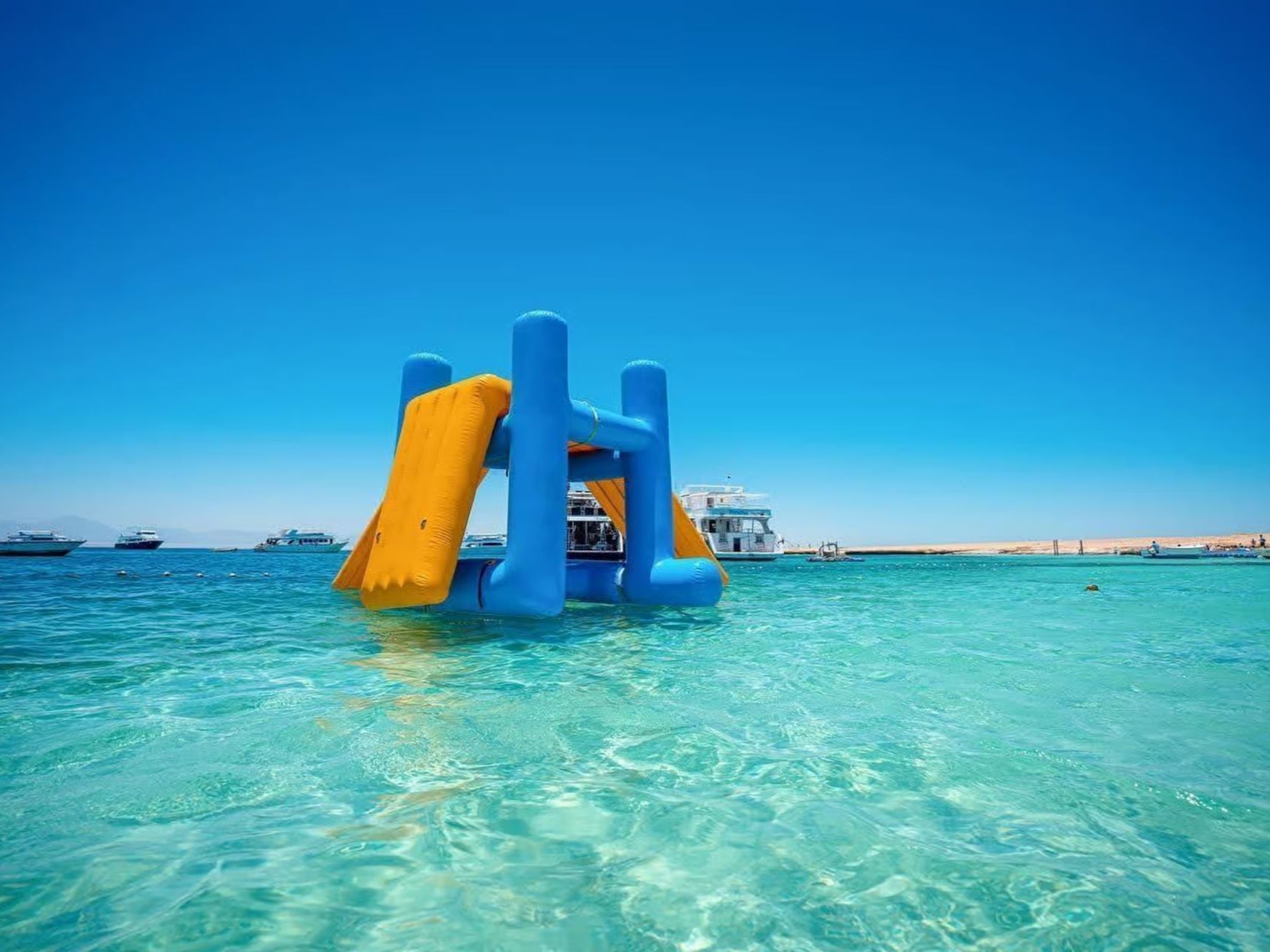Swing in turquoise water