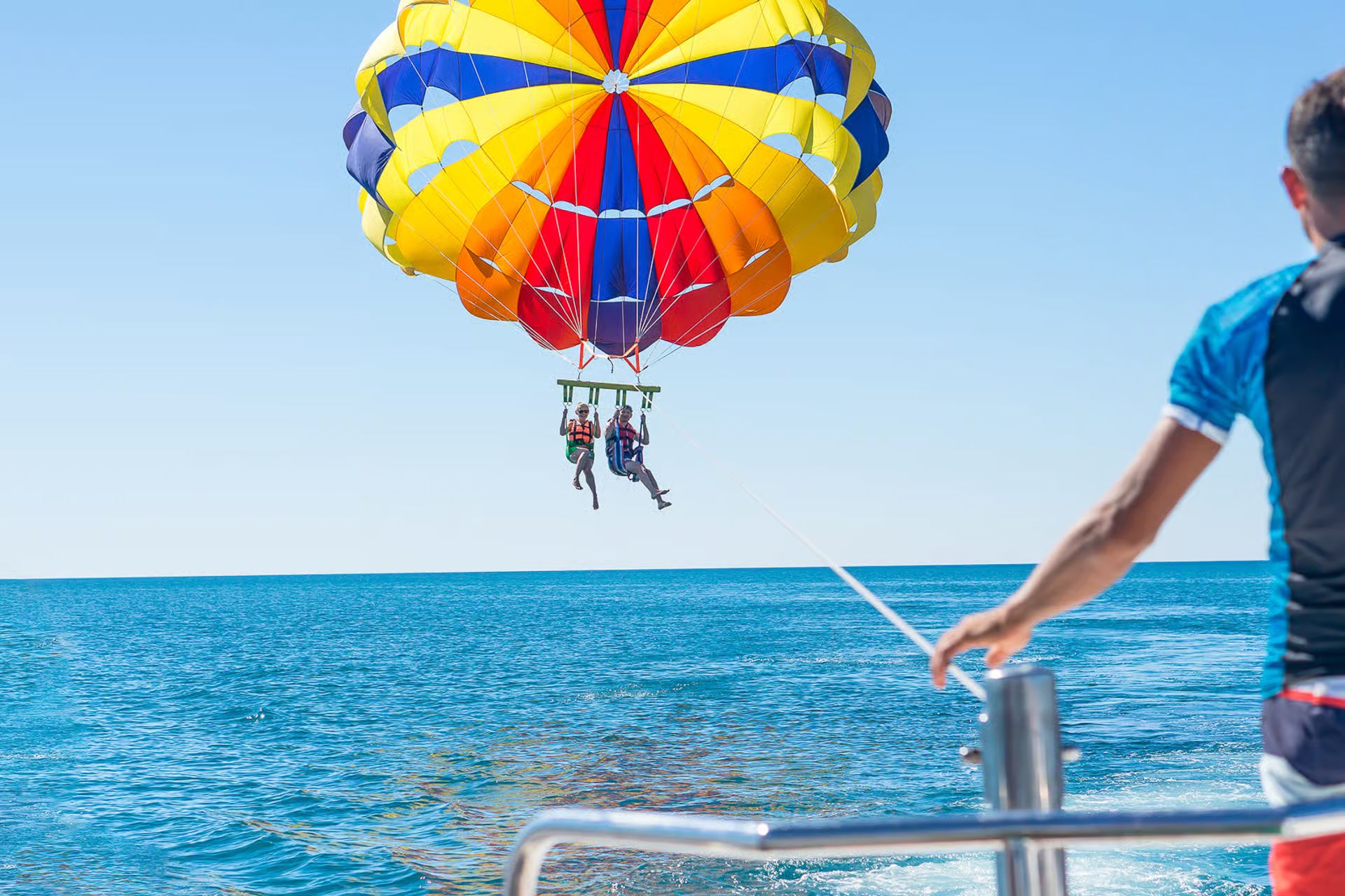 Tandem parasailing couple