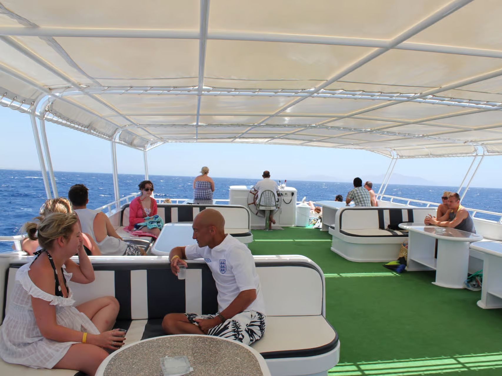 Guests relaxing on the sun deck